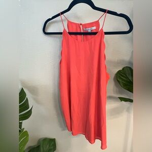 Cute going out tank with spaghetti straps, racer back and scallop details